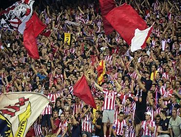 Atletico fans celebrate their Supercopa win 